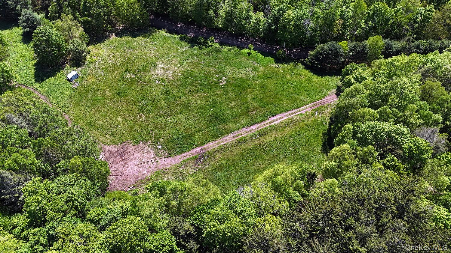John Milk Road Long Eddy, NY 13783 - Photo 32 of 50 a view of a garden with a building and plants