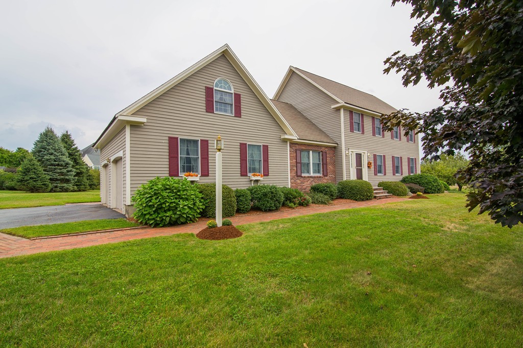 64 Chamberlain Road Westford, MA 01886 - Photo 2 of 27 a view of a yard in front of house