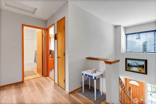a view of workspace with furniture and window