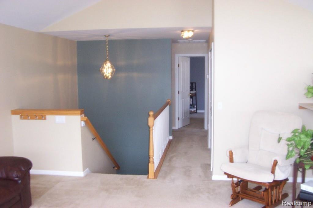 4257 Hampton Ridge Boulevard, Unit 132 Howell, MI 48843 - Photo 10 of 22 living room towards bedrooms