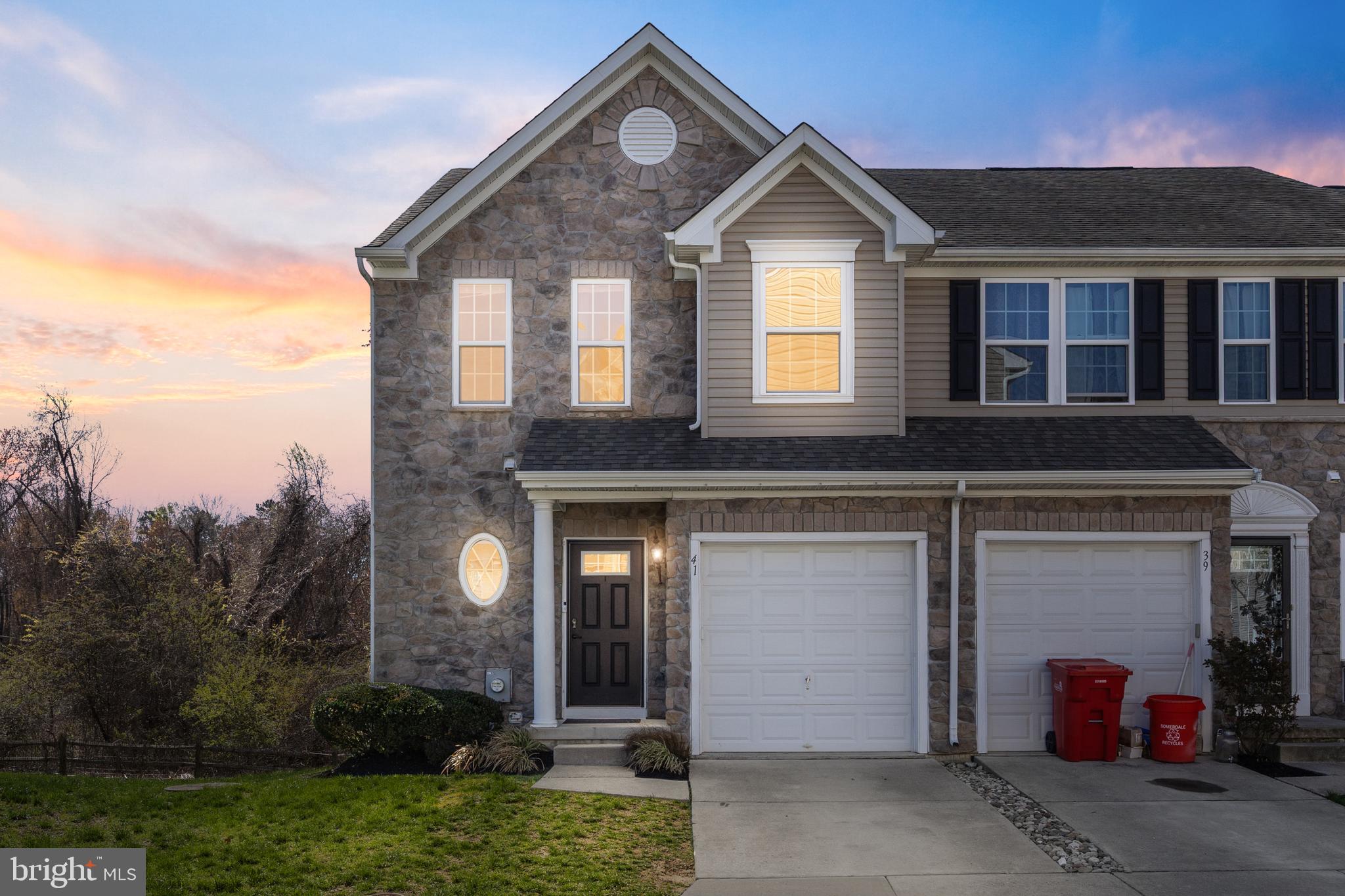 41 Franklin Circle Somerdale, NJ 08083 - Photo 1 of 26 a front view of a house with garden
