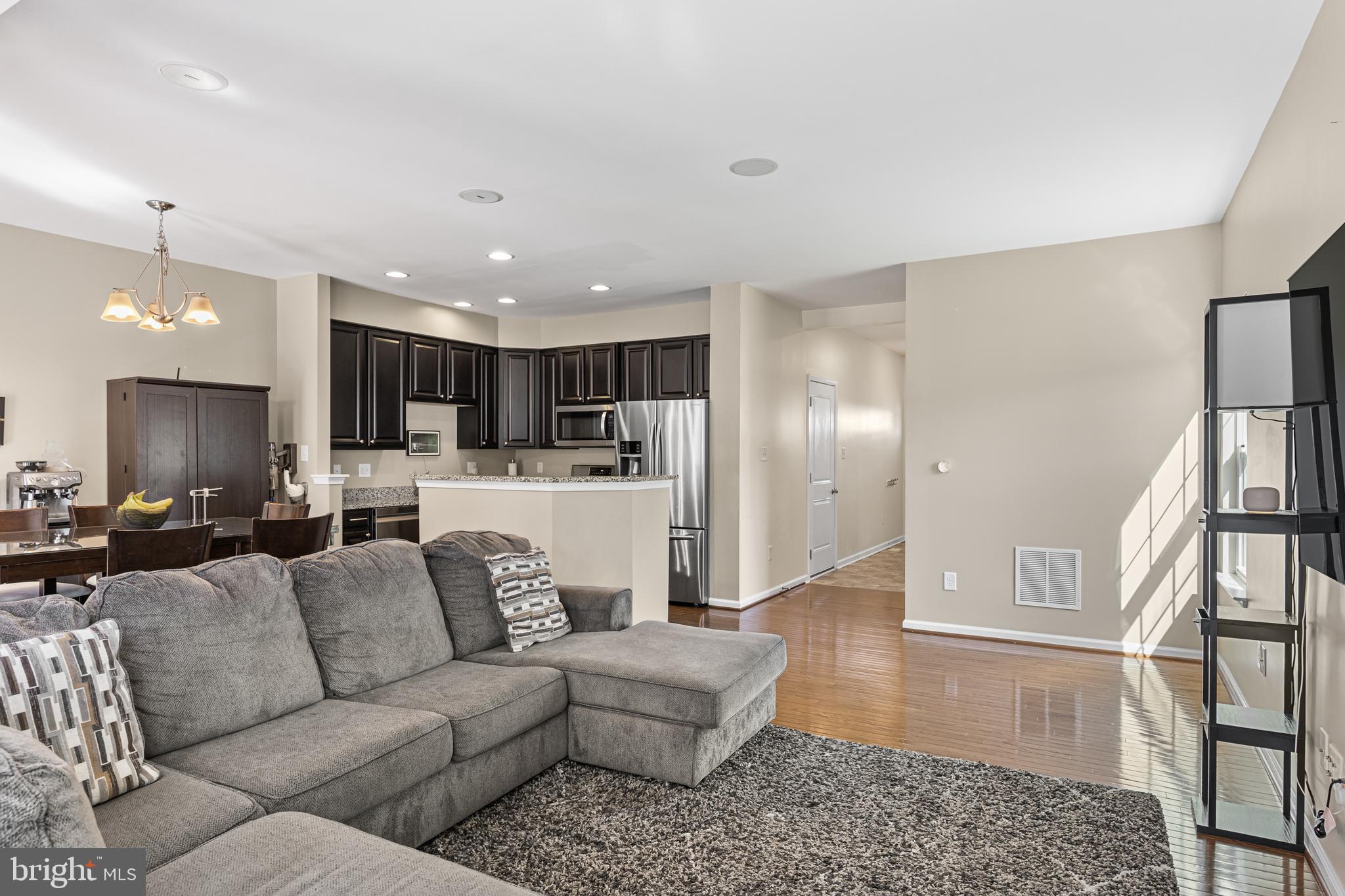 41 Franklin Circle Somerdale, NJ 08083 - Photo 13 of 26 a view of a living room kitchen and a wooden floor