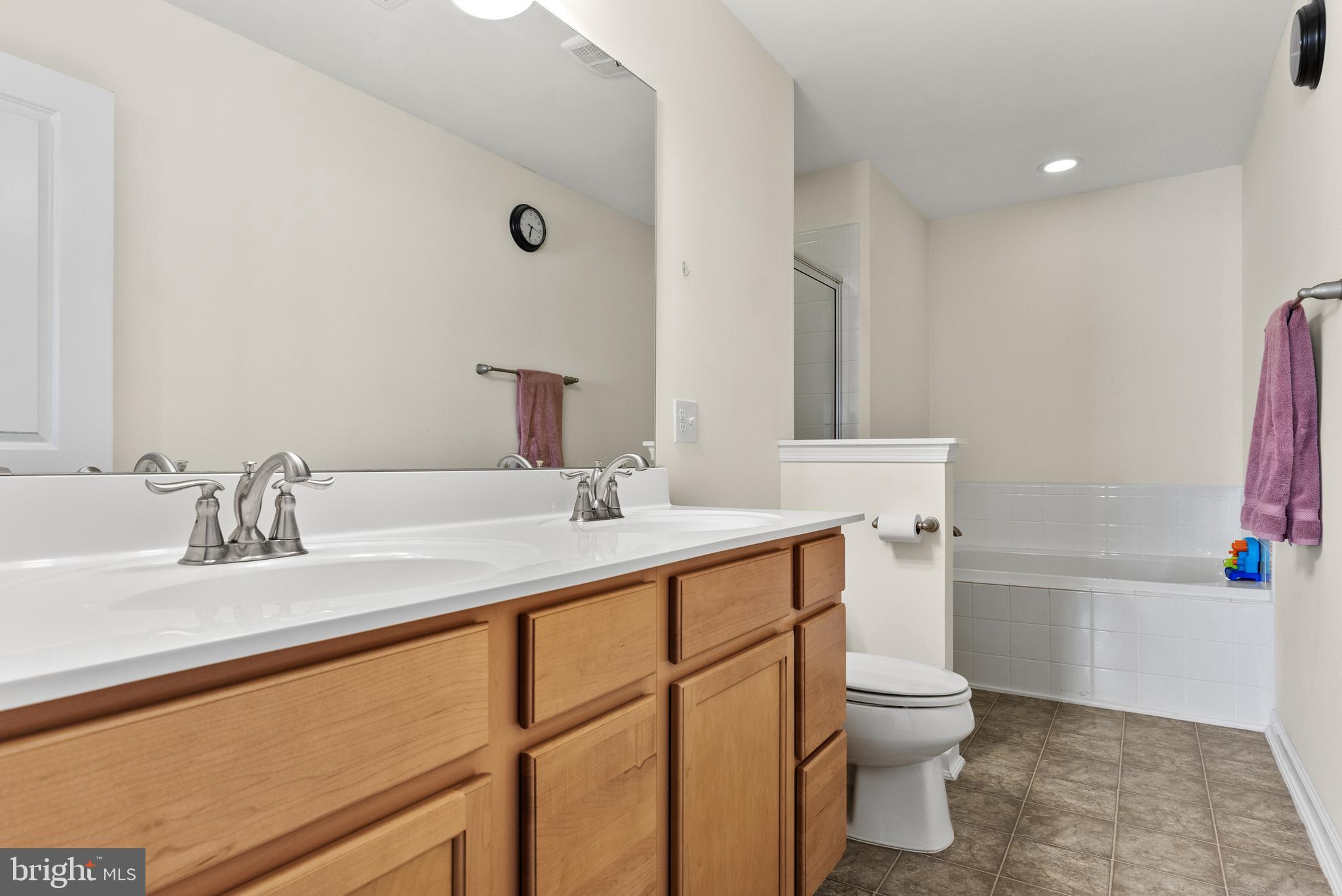 41 Franklin Circle Somerdale, NJ 08083 - Photo 17 of 26 a bathroom with a sink toilet and shower