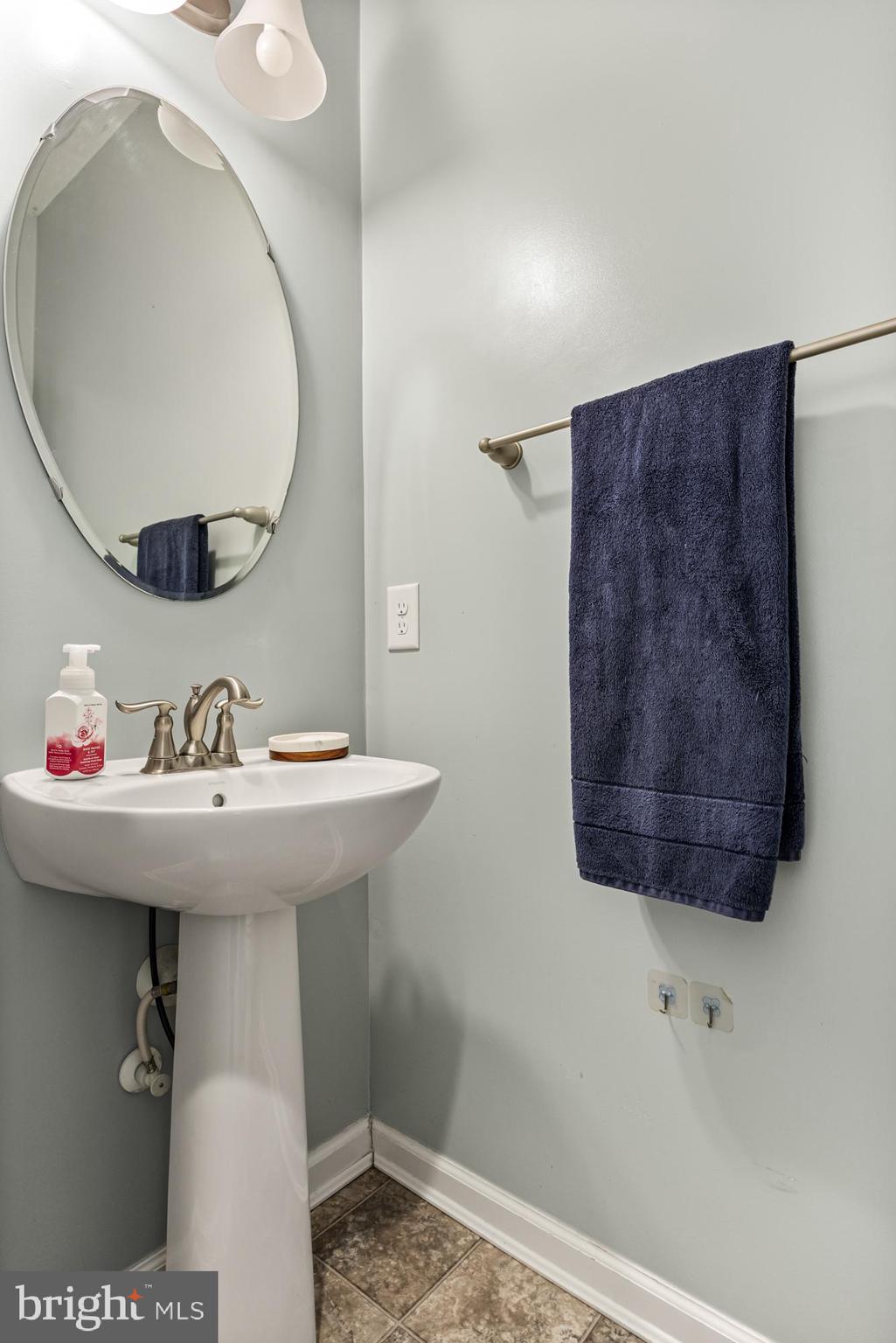 41 Franklin Circle Somerdale, NJ 08083 - Photo 6 of 26 a bathroom with a sink and mirror