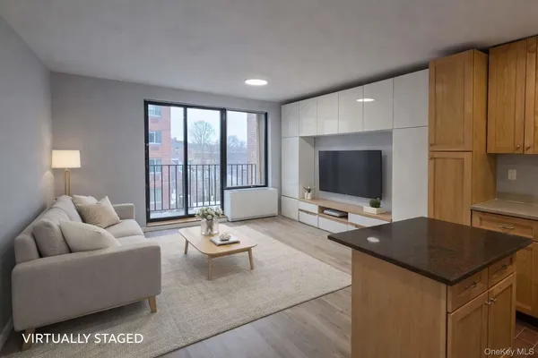 a kitchen with sink and cabinets