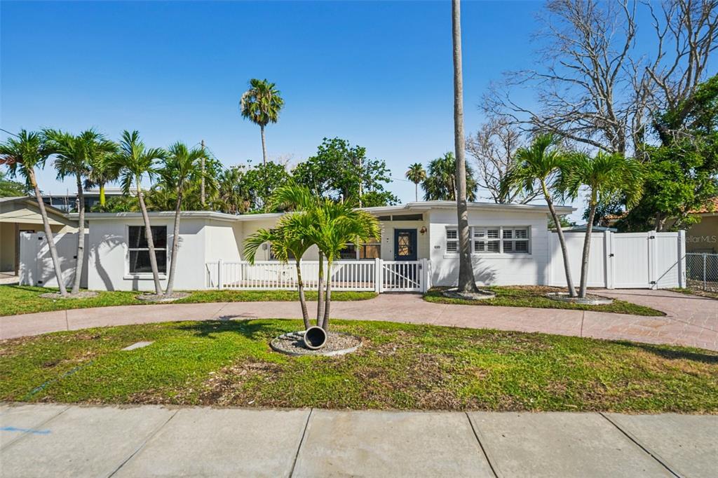 709 Pruitt Drive Madeira Beach, FL 33708 - Photo 1 of 1 a front view of a house with a yard