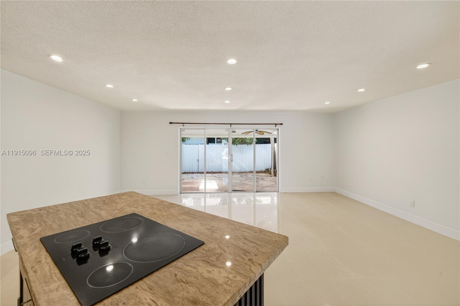 6822 West 2nd Lane Hialeah, FL 33014 - Photo 12 of 36 a living room with a couch