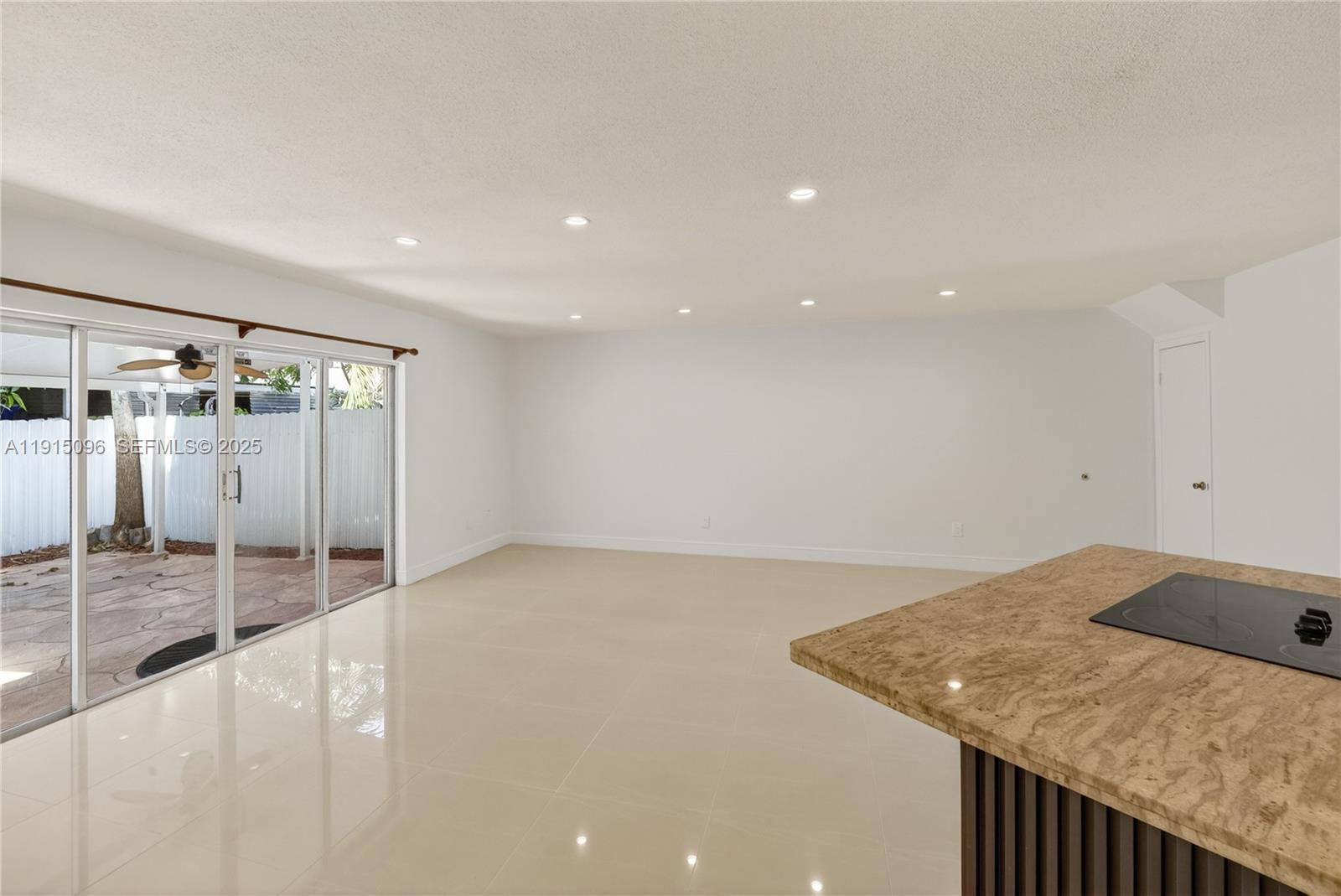 6822 West 2nd Lane Hialeah, FL 33014 - Photo 13 of 36 a kitchen with a sink and a refrigerator