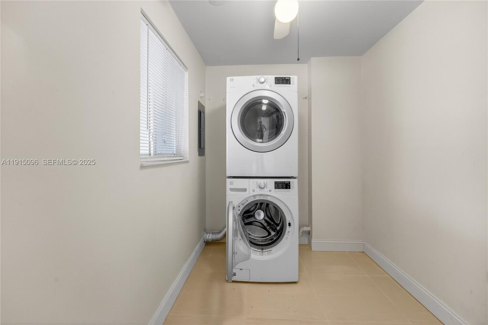 6822 West 2nd Lane Hialeah, FL 33014 - Photo 16 of 36 a utility room with dryer and washer