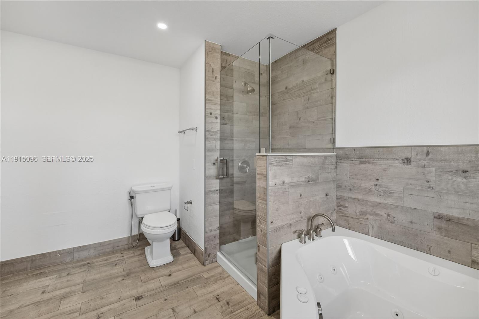 6822 West 2nd Lane Hialeah, FL 33014 - Photo 26 of 36 a bathroom with a sink toilet and shower