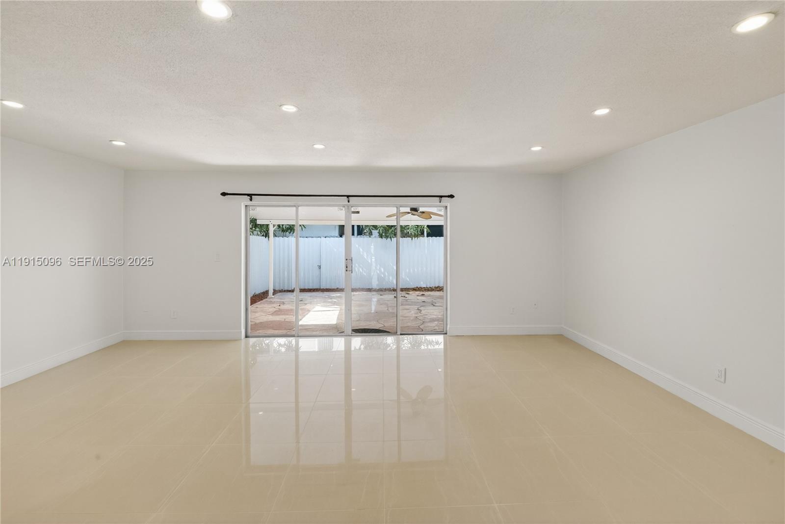 6822 West 2nd Lane Hialeah, FL 33014 - Photo 10 of 36 an empty room with cabinet and mirrors