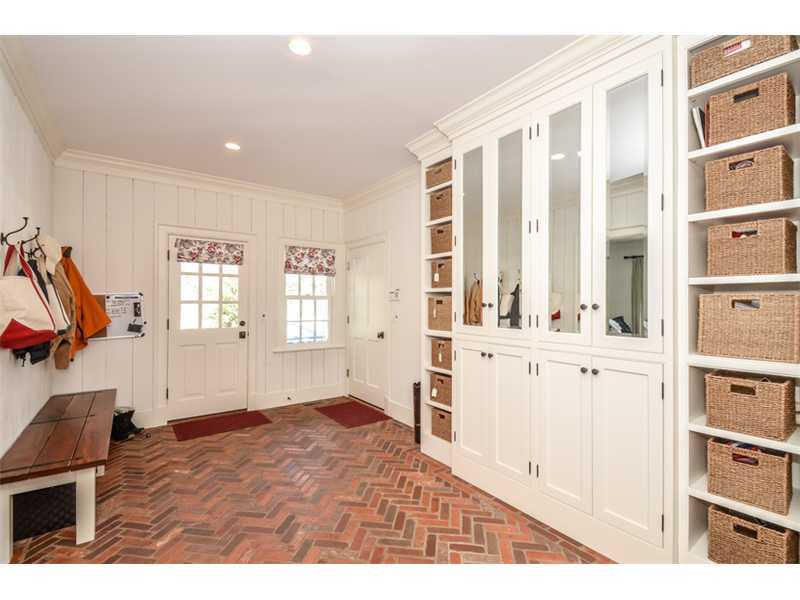 527 Middlesex Road Darien, CT 06820 - Photo 13 of 25 a view of a bedroom with wooden floor and windows