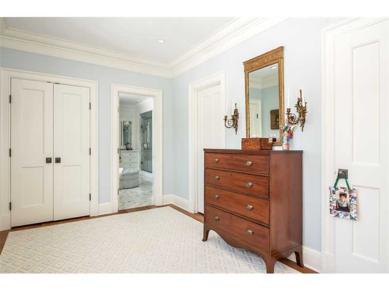 527 Middlesex Road Darien, CT 06820 - Photo 20 of 25 a room with a dresser and a mirror