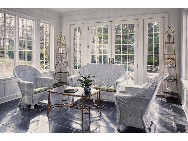 527 Middlesex Road Darien, CT 06820 - Photo 6 of 25 a outdoor living space with furniture and floor to ceiling windows