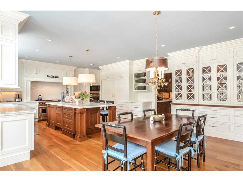 527 Middlesex Road Darien, CT 06820 - Photo 9 of 25 a kitchen with a table and chairs in it