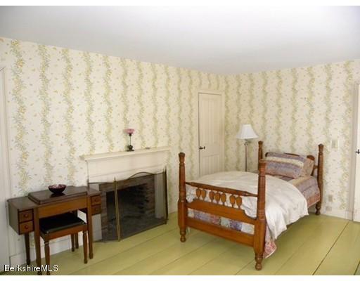 1 Bray Road Heath, MA 01346 - Photo 12 of 23 a bedroom with a bed and a table