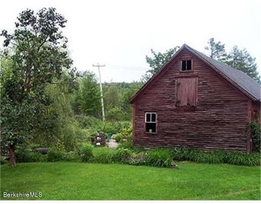 1 Bray Road Heath, MA 01346 - Photo 21 of 23 a view of a backyard with potted plants and large tree