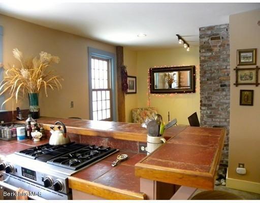 1 Bray Road Heath, MA 01346 - Photo 4 of 23 a kitchen with a sink and a stove top oven