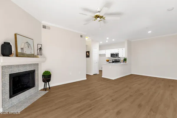 a view of a kitchen with furniture and a fireplace