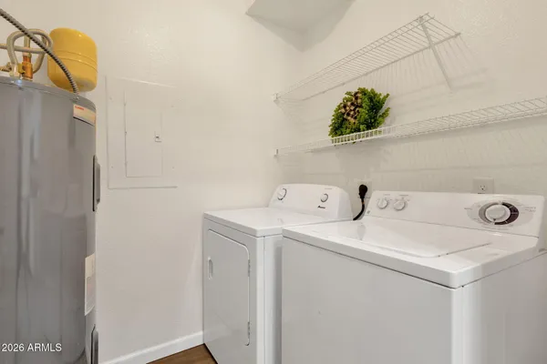 a utility room with dryer and washer