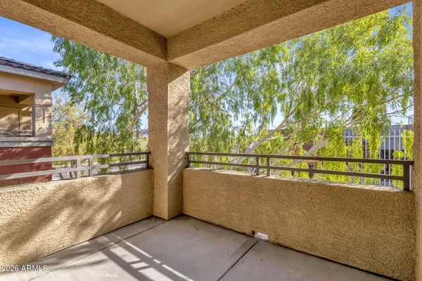 a view of a balcony with city view