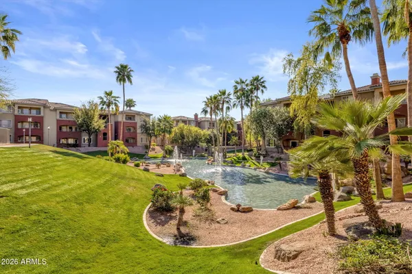 a view of a swimming pool with a yard