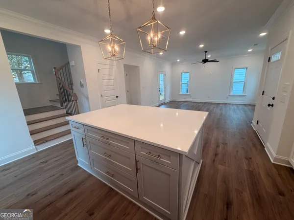 a room with wooden floors and lots of wooden floors