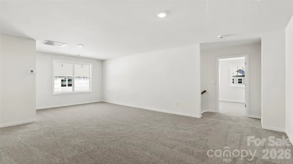 an empty room with a natural light