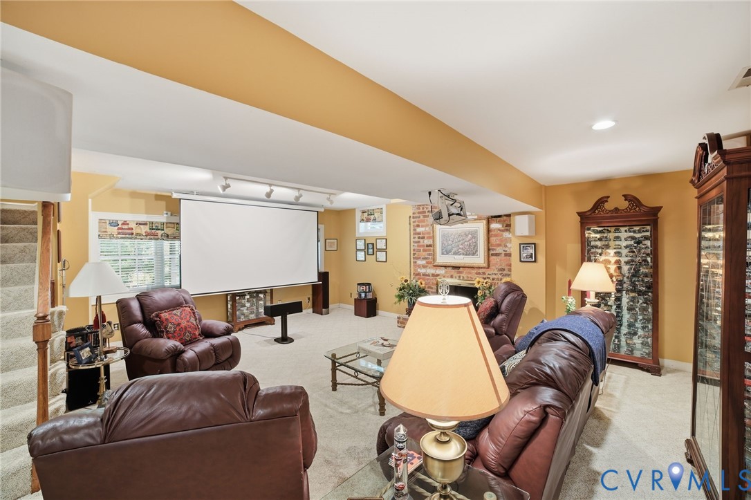 3950 Reeds Landing Circle Midlothian, VA 23113 - Photo 31 of 50 a living room with furniture a rug and a large window
