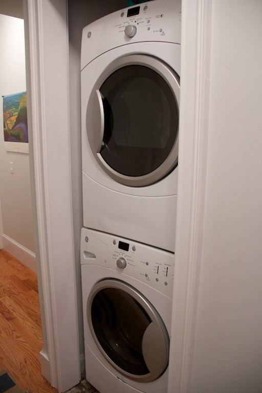 1089 Beacon Street, Unit 1 Brookline, MA 02446 - Photo 12 of 14 a close up view of a washer and dryer