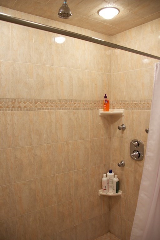 1089 Beacon Street, Unit 1 Brookline, MA 02446 - Photo 13 of 14 a bathroom with a shower