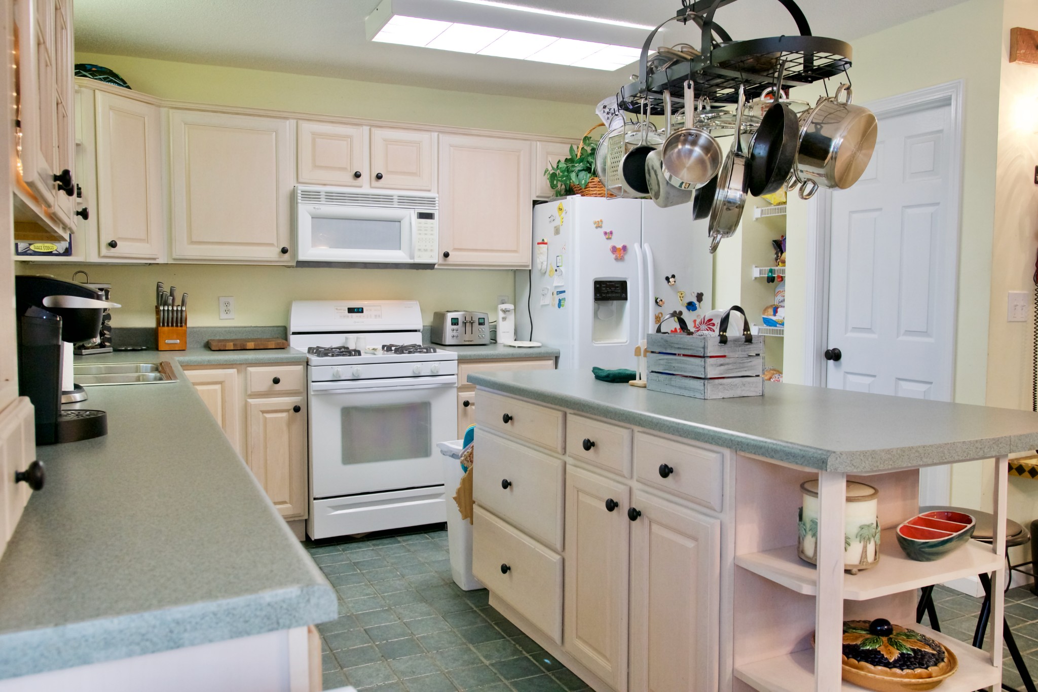 3203 Austin Bottom Road Baxter, TN 38544 - Photo 16 of 41 a kitchen with white cabinets and white appliances