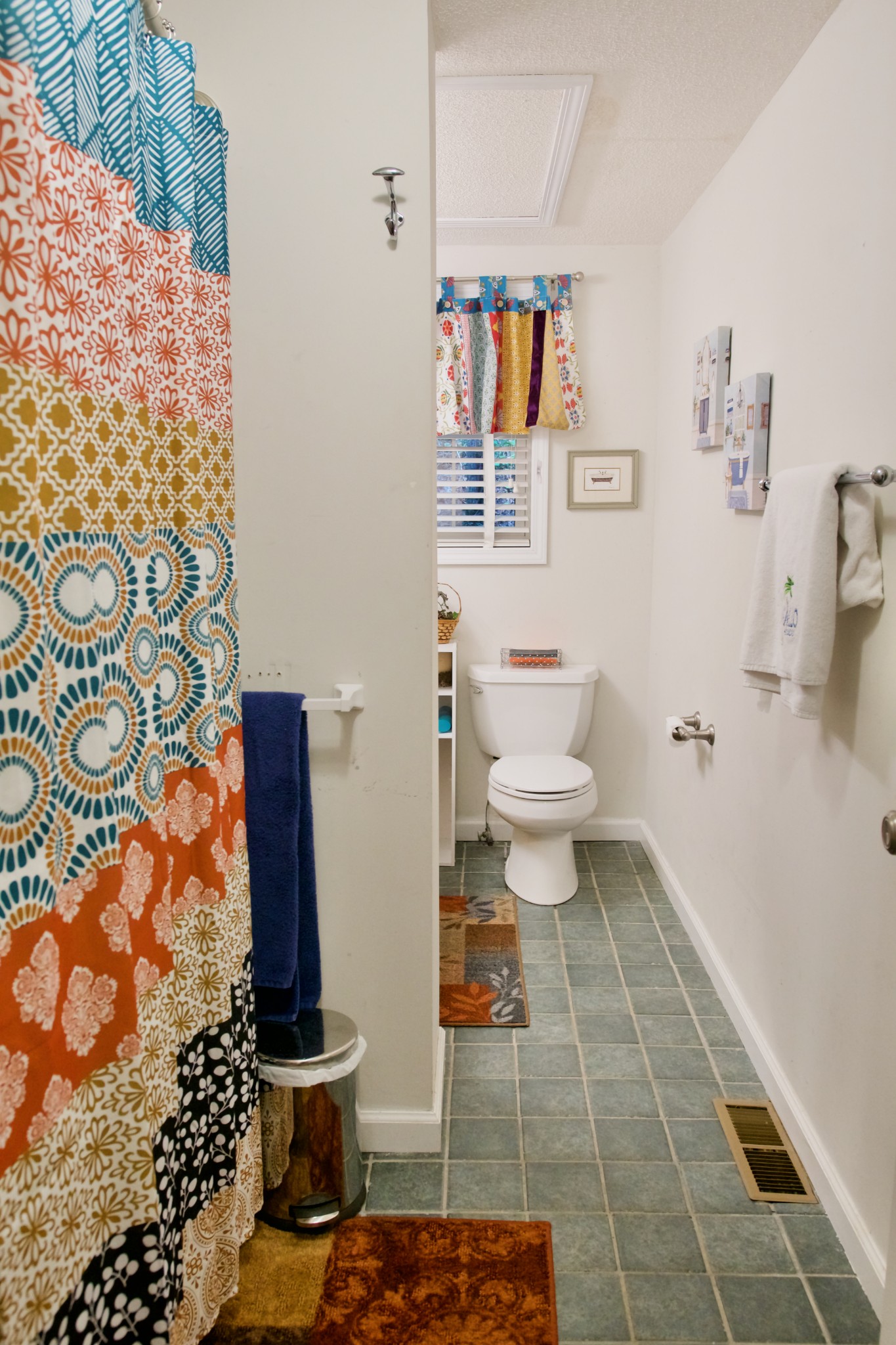 3203 Austin Bottom Road Baxter, TN 38544 - Photo 23 of 41 a bathroom with a toilet and a shower curtain