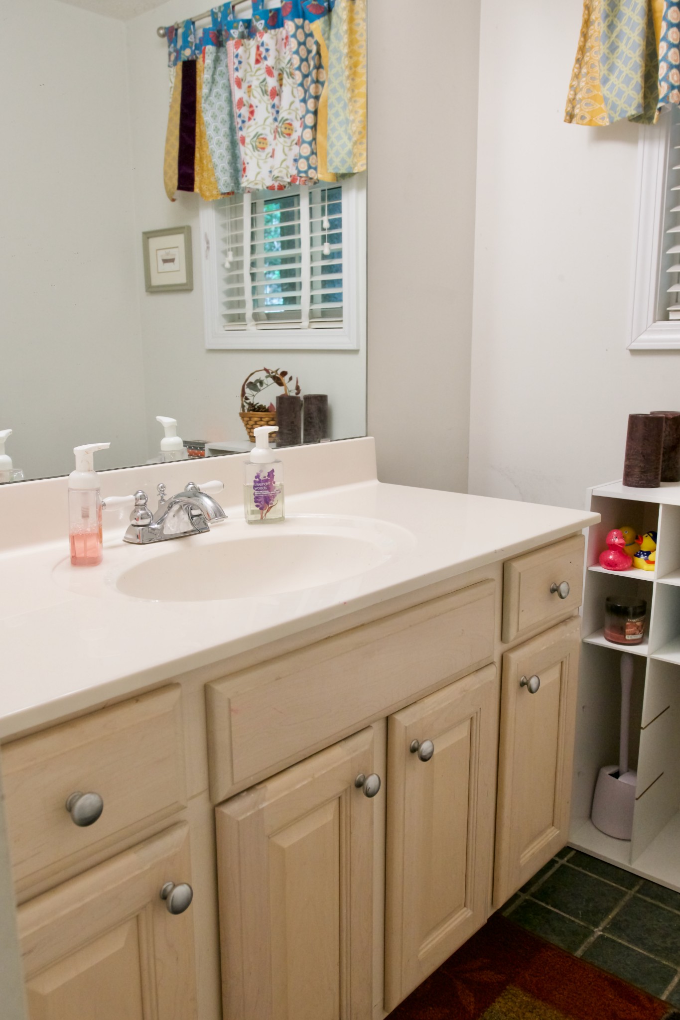3203 Austin Bottom Road Baxter, TN 38544 - Photo 24 of 41 a bathroom with a sink cabinets and a window