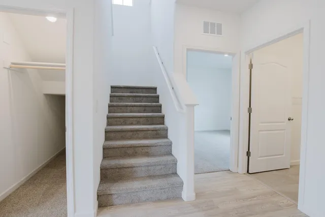 a bathroom with a sink toilet and vanity