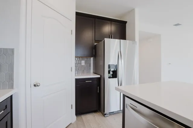 a view of an entryway with hallway