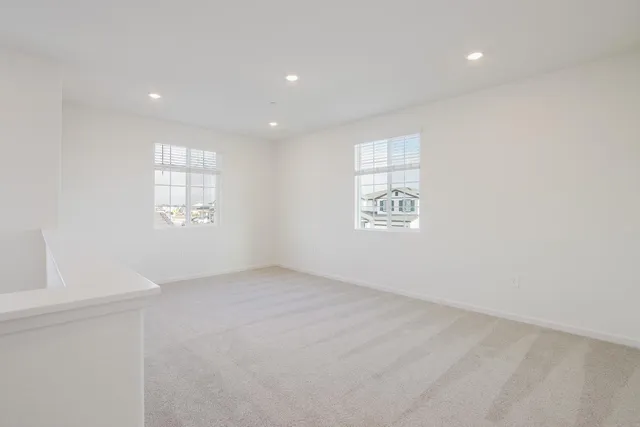 a bathroom with a double vanity sink and mirror
