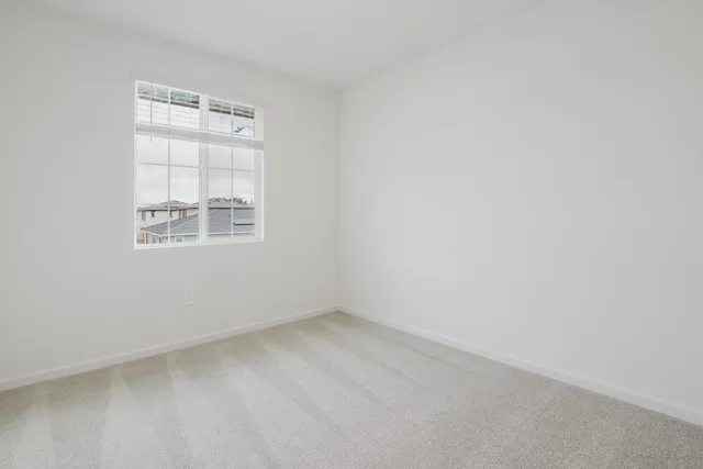 a view of a backyard with sitting area