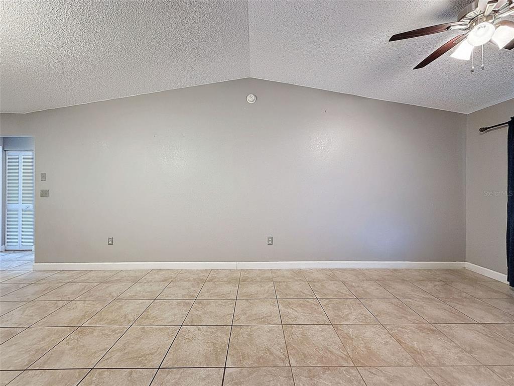 7116 Barclay Avenue, Unit B Spring Hill, FL 34609 - Photo 16 of 31 a view of an empty room