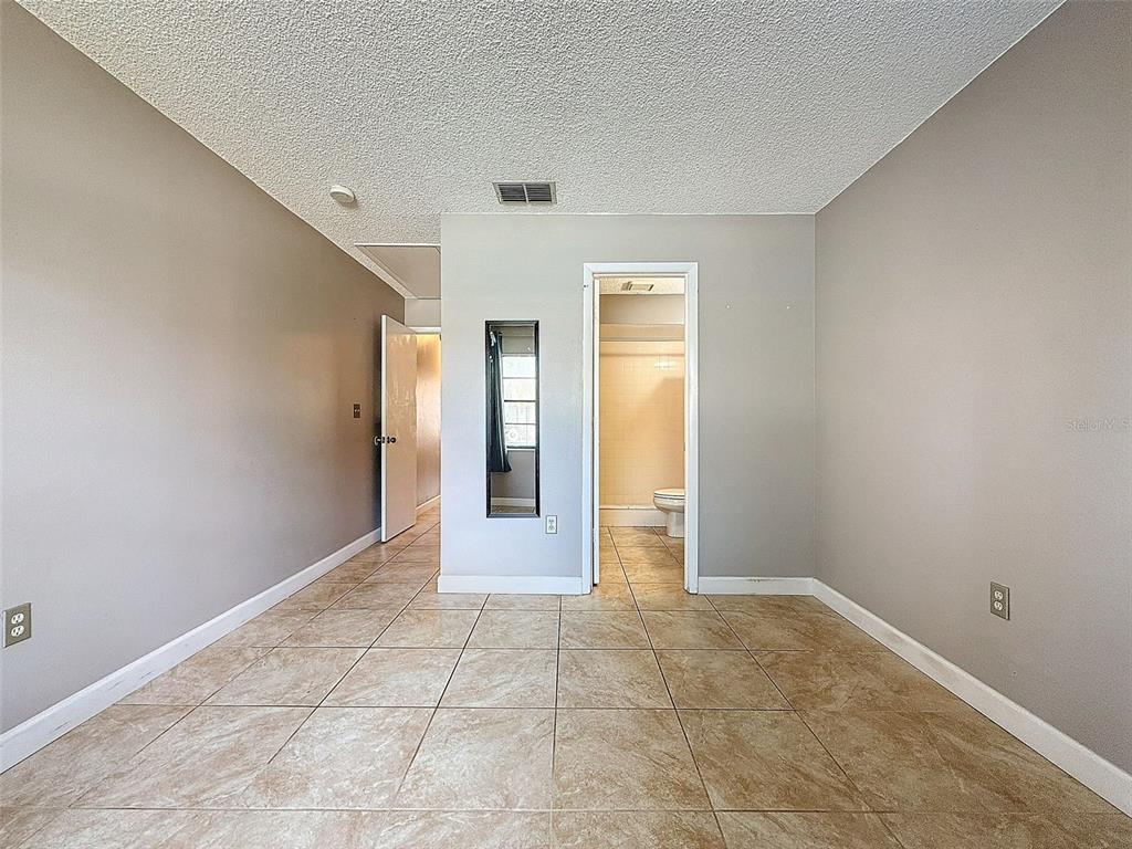 7116 Barclay Avenue, Unit B Spring Hill, FL 34609 - Photo 22 of 31 a view of an empty room