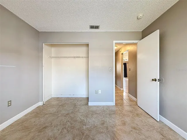 wooden floor and closet in a room