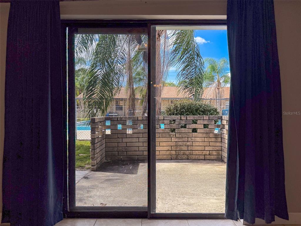 7116 Barclay Avenue, Unit B Spring Hill, FL 34609 - Photo 25 of 31 a view of a glass door