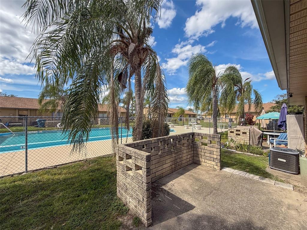 7116 Barclay Avenue, Unit B Spring Hill, FL 34609 - Photo 29 of 31 a view of outdoor space with seating area