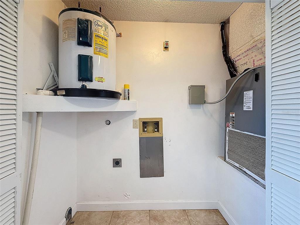 7116 Barclay Avenue, Unit B Spring Hill, FL 34609 - Photo 8 of 31 a bathroom with a sink and mirror