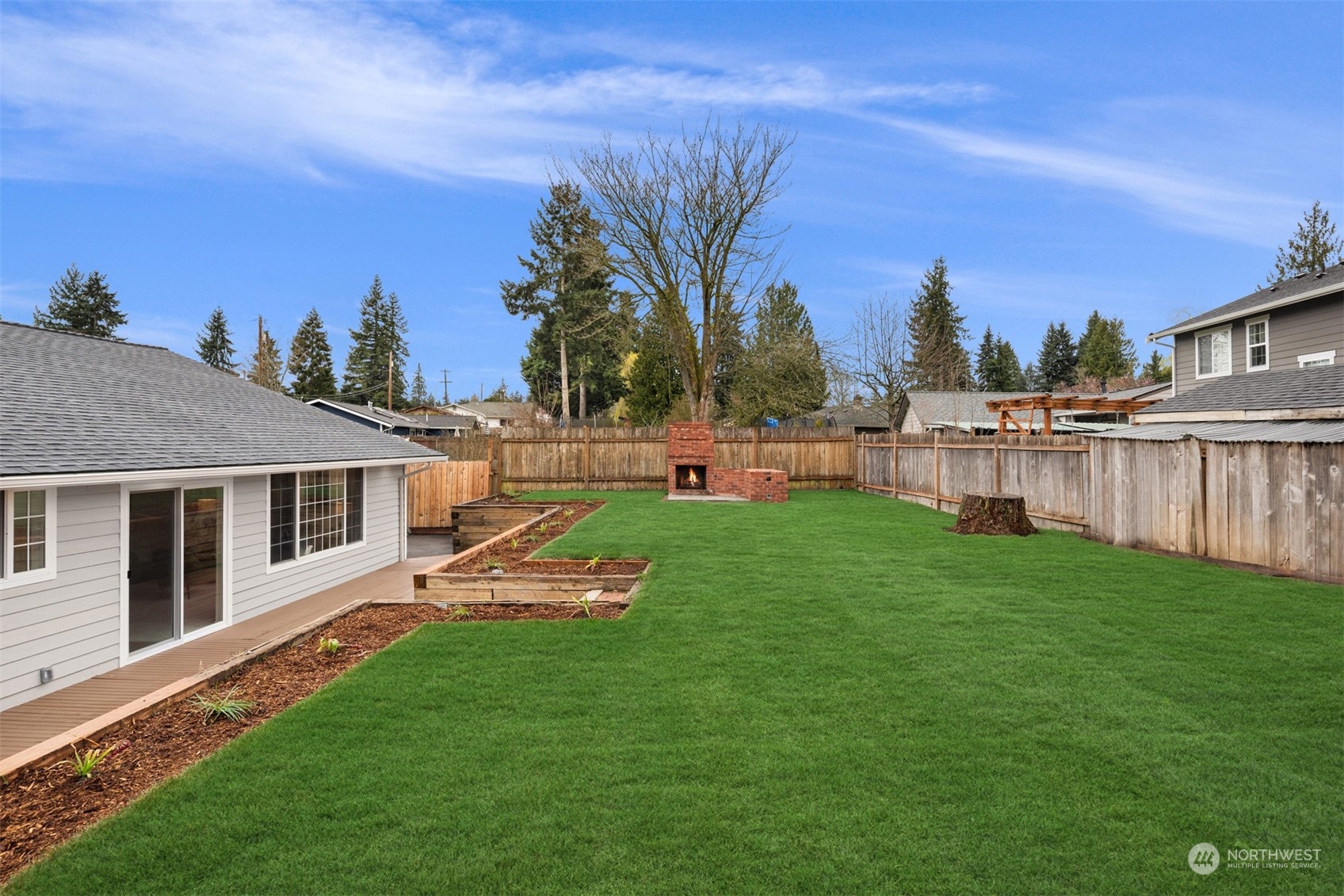 4103 223rd Street Southwest Mountlake Terrace, WA 98043 - Photo 27 of 38 a view of a house with backyard and sitting area