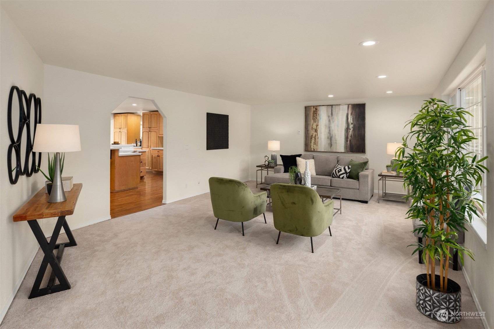 4103 223rd Street Southwest Mountlake Terrace, WA 98043 - Photo 10 of 38 a living room with furniture and a potted plant