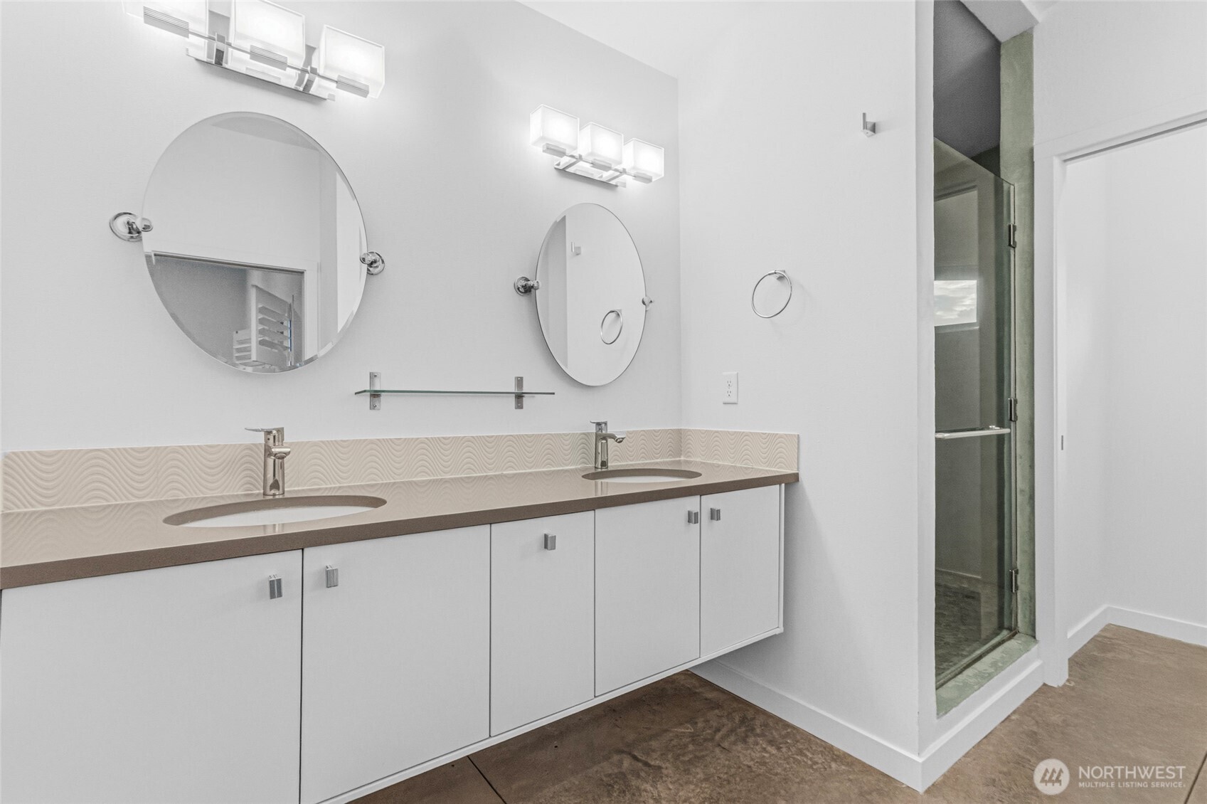 4205 Plum Point Road Grand Coulee, WA 99133 - Photo 25 of 39 a bathroom with a double vanity sink and a mirror
