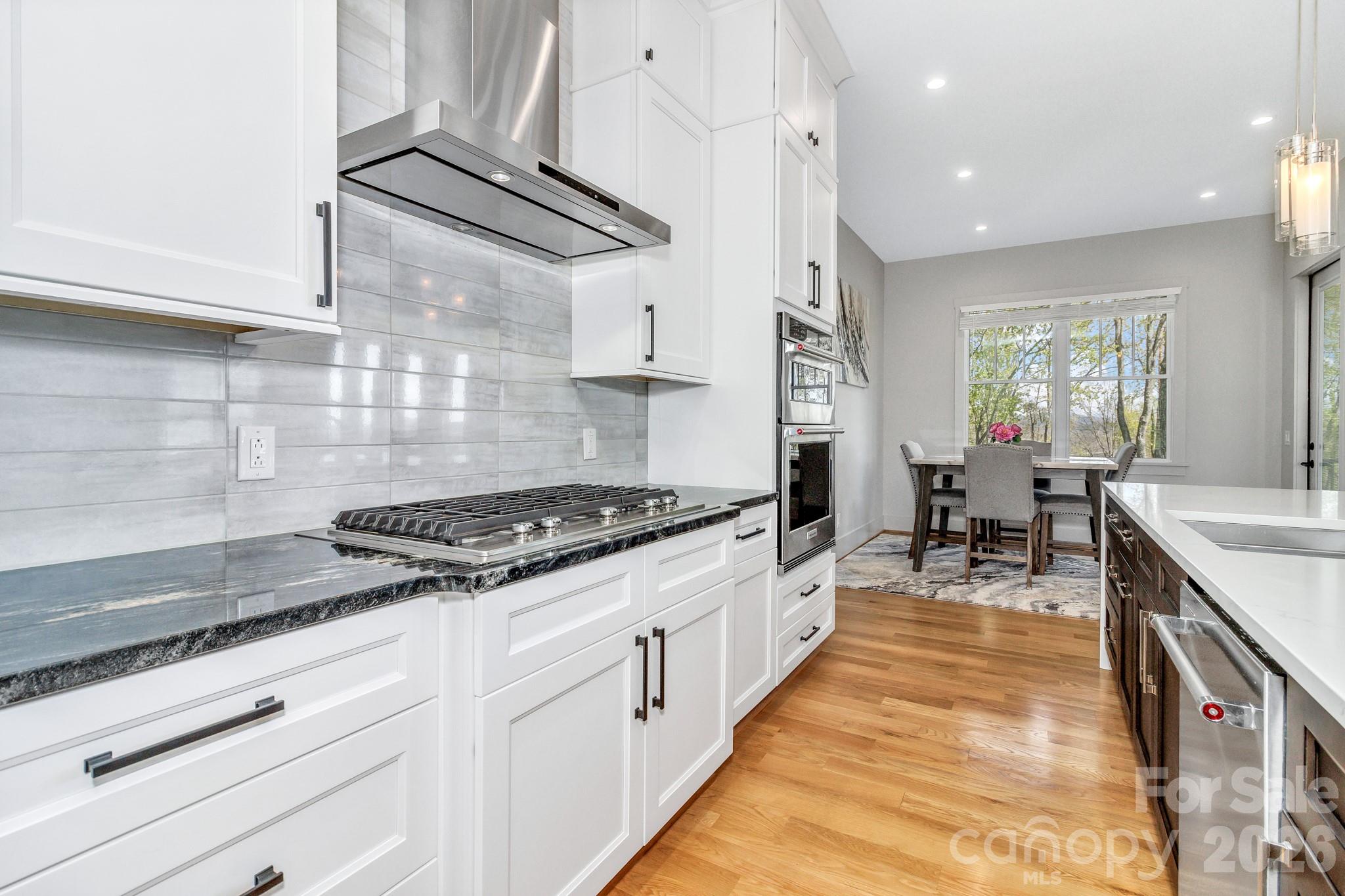 301 Rockbridge Road Mills River, NC 28759 - Photo 15 of 48 a kitchen with sink stove and cabinets