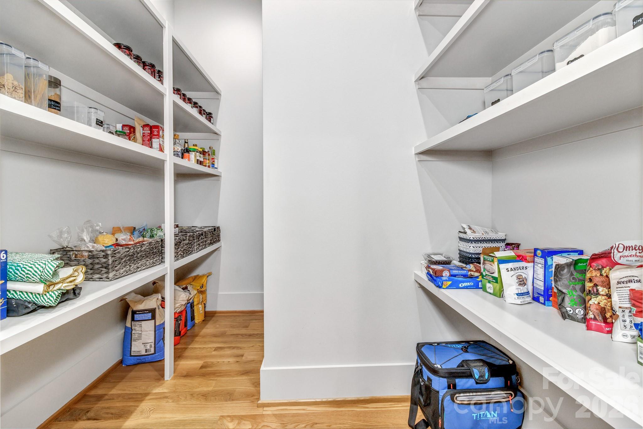 301 Rockbridge Road Mills River, NC 28759 - Photo 17 of 48 a utility room with lots of clutter and cabinets