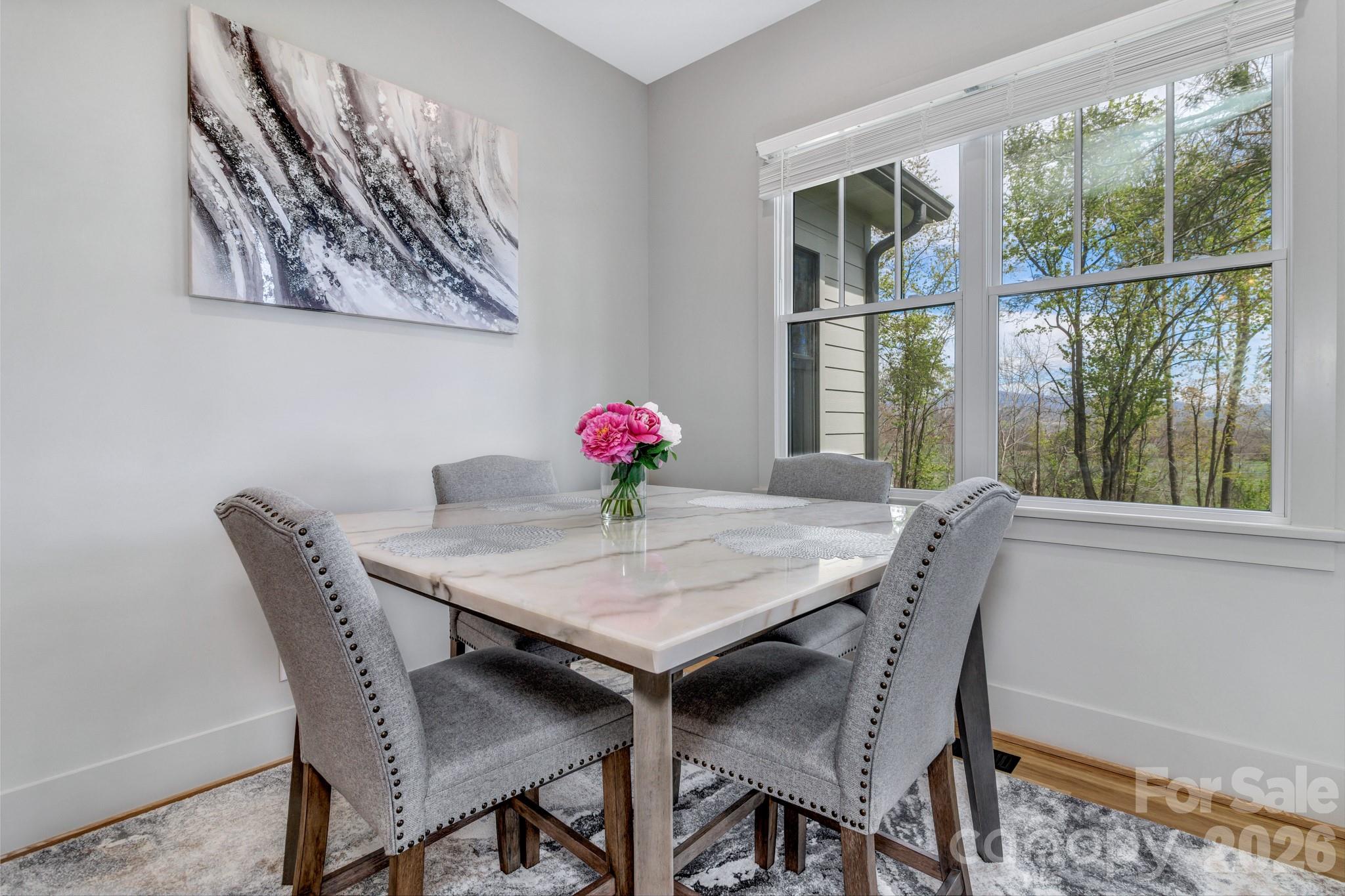 301 Rockbridge Road Mills River, NC 28759 - Photo 19 of 48 a view of a dining room with furniture and window